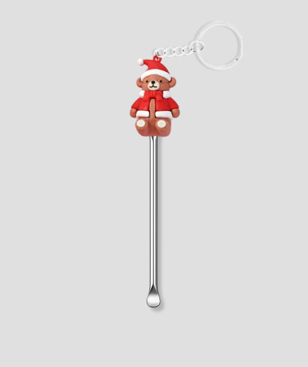 scoop with a Christmas figurine