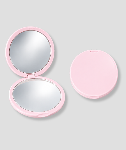Pink compact makeup mirror (open and closed views) on a light gray background