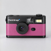 Roze FestiSnap retro camera van voren met lens, zoeker en flitser