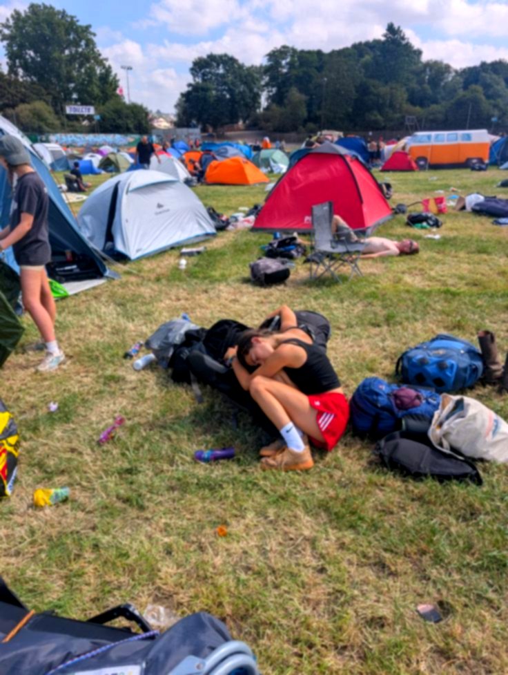 Festival campground with tents in the sun